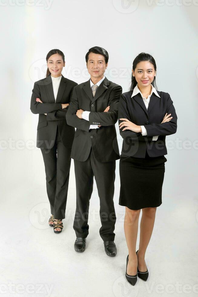 Young Asian male female wearing business office suit stand look at camera cross hand photo