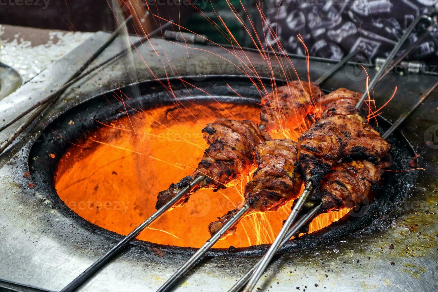 Tandoori Chicken cooked fire photo
