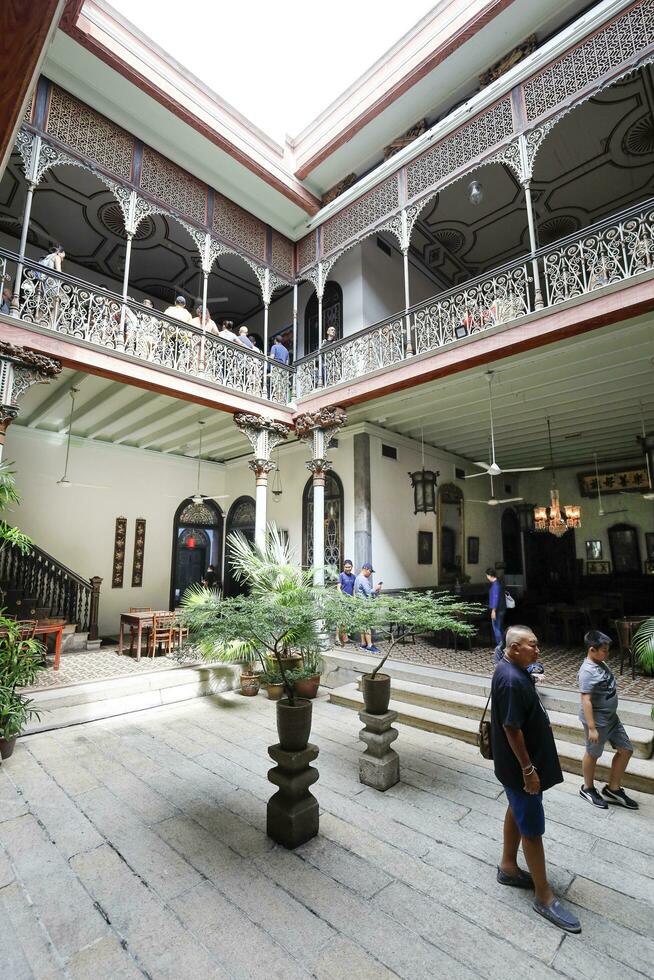 George Town, Penang, Malaysia  June 5, 2019 Cheong Fatt Tze, The Blue mansion was built at the end of 19th century by Chinese merchant. photo