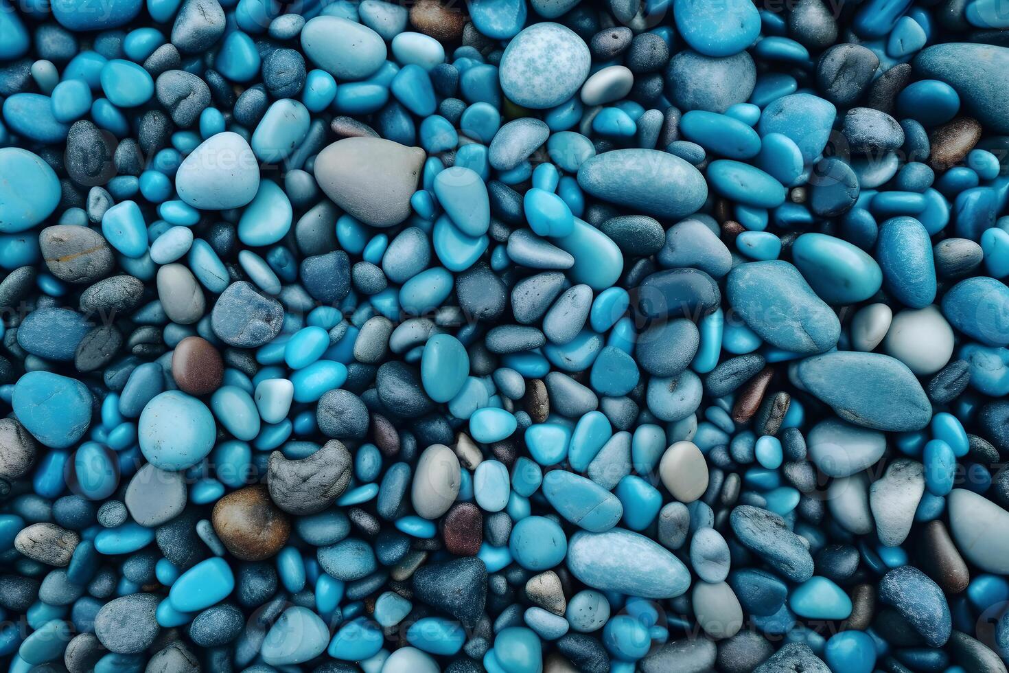 background made up of blue pebbles arranged in a mosaic pattern. The pebbles vary in shades of blue and are rounded and smooth in texture, made with photo