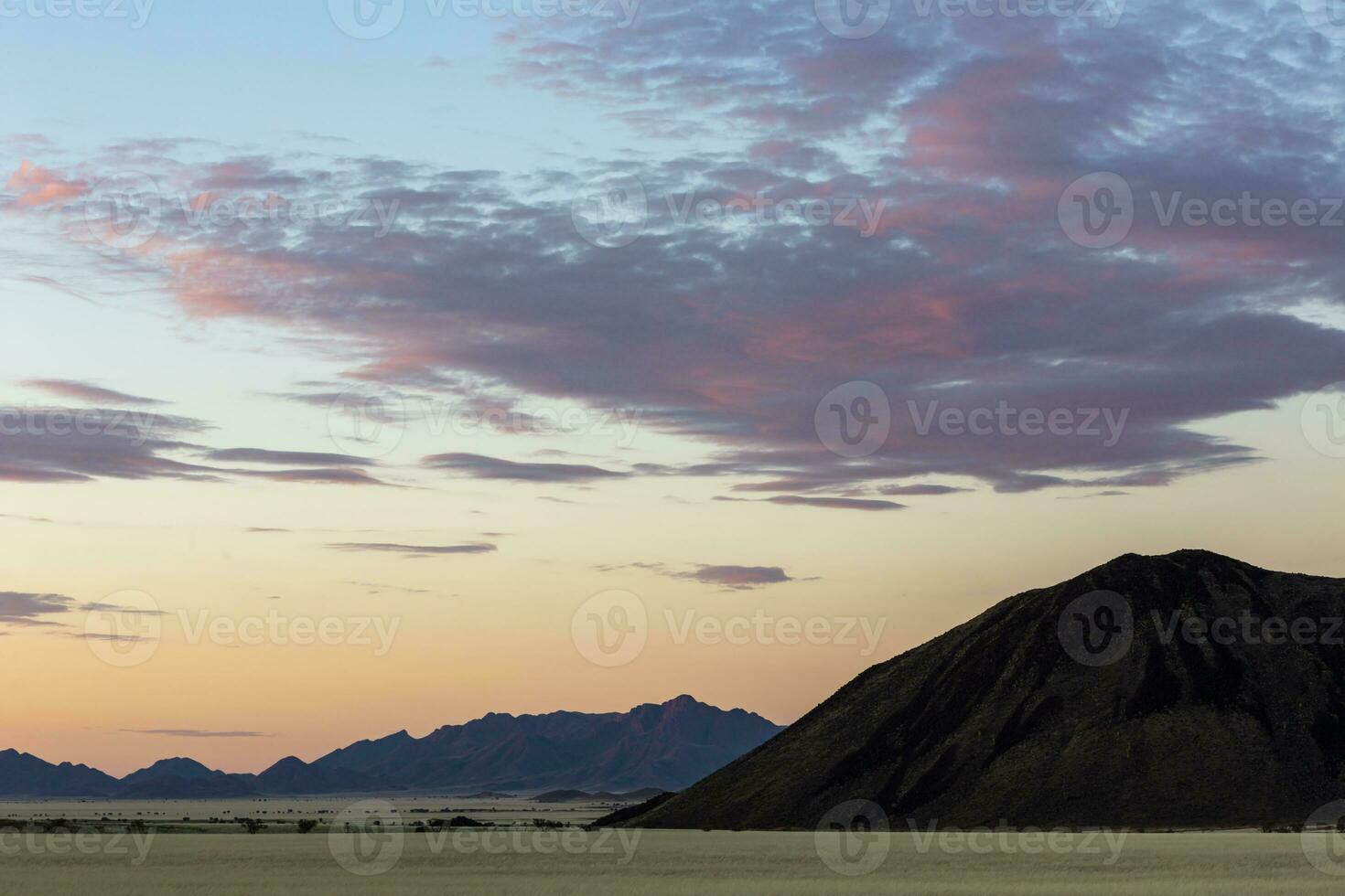 Clouds colored red after sunset photo