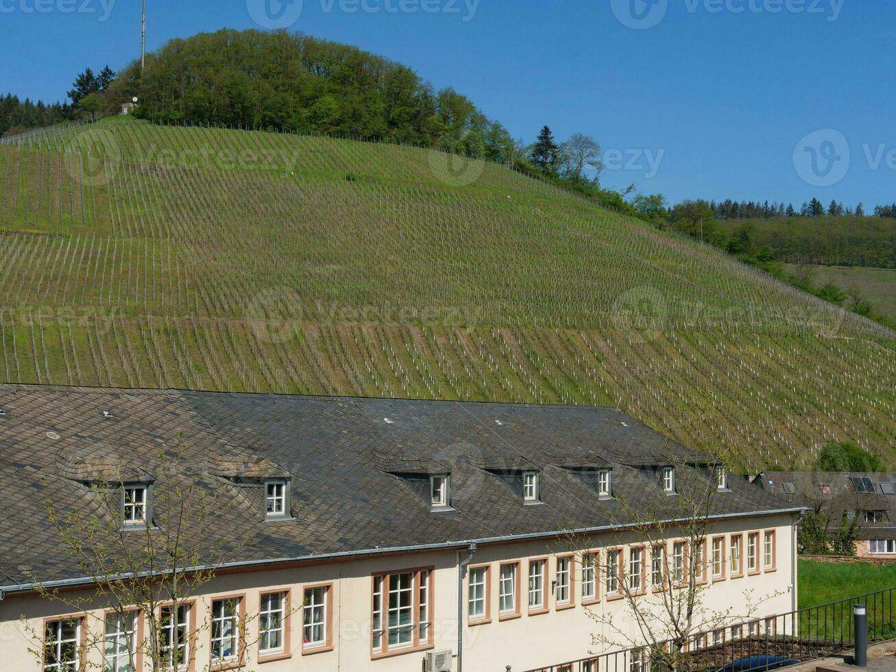 The small city of Saarburg at the saar river in germany photo