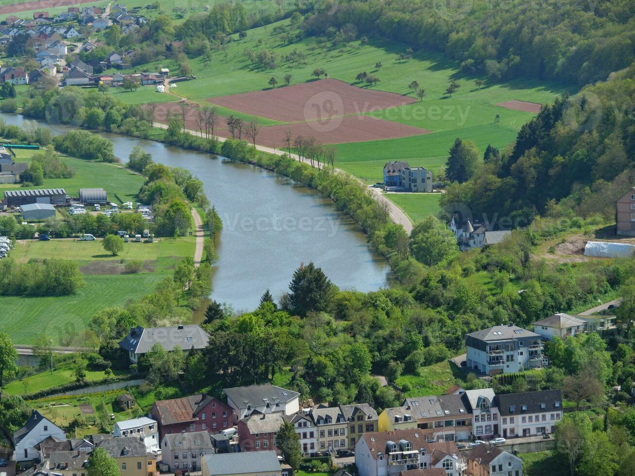 The small city of Saarburg at the saar river in germany photo