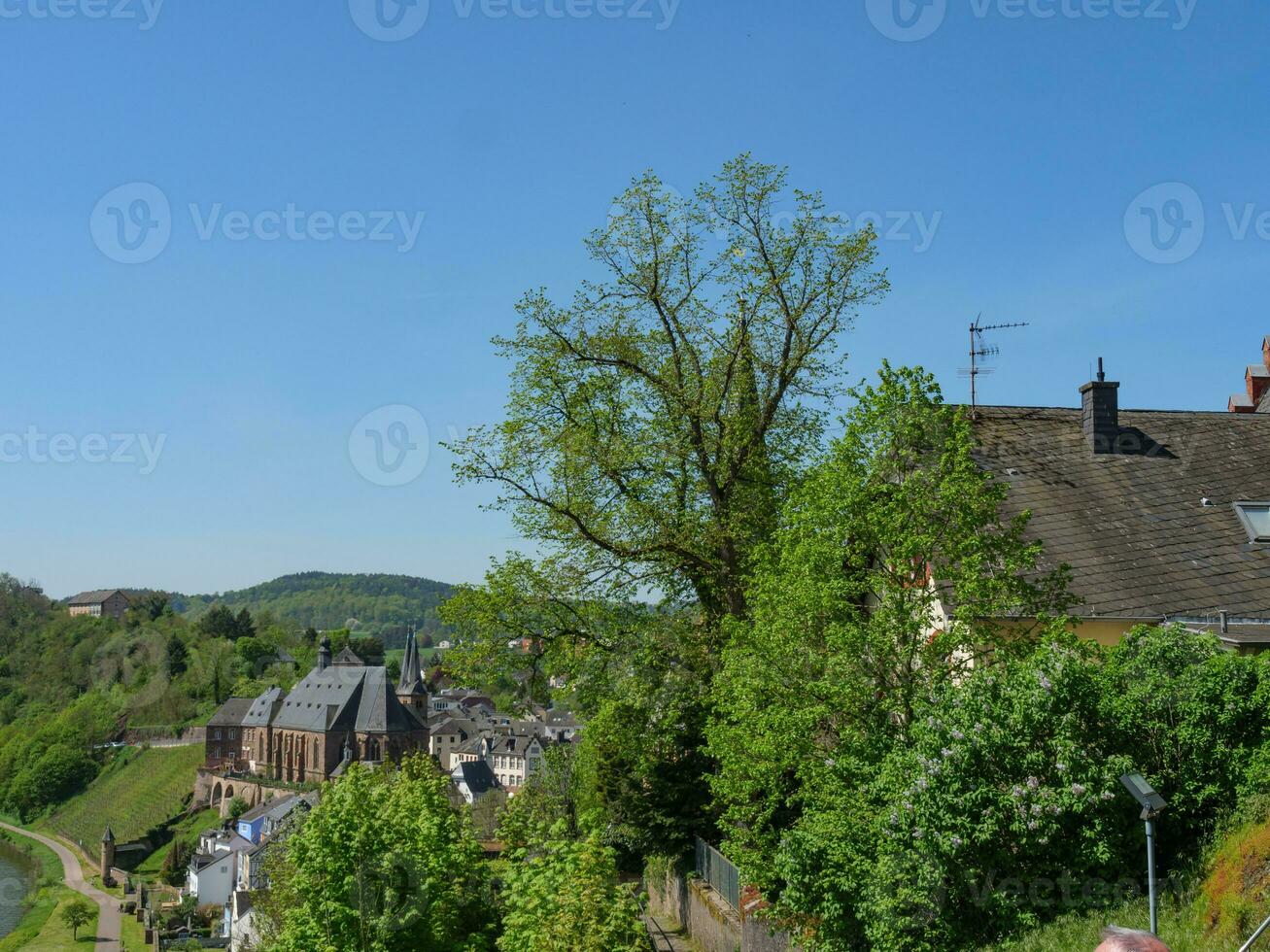 The small city of Saarburg at the saar river in germany photo