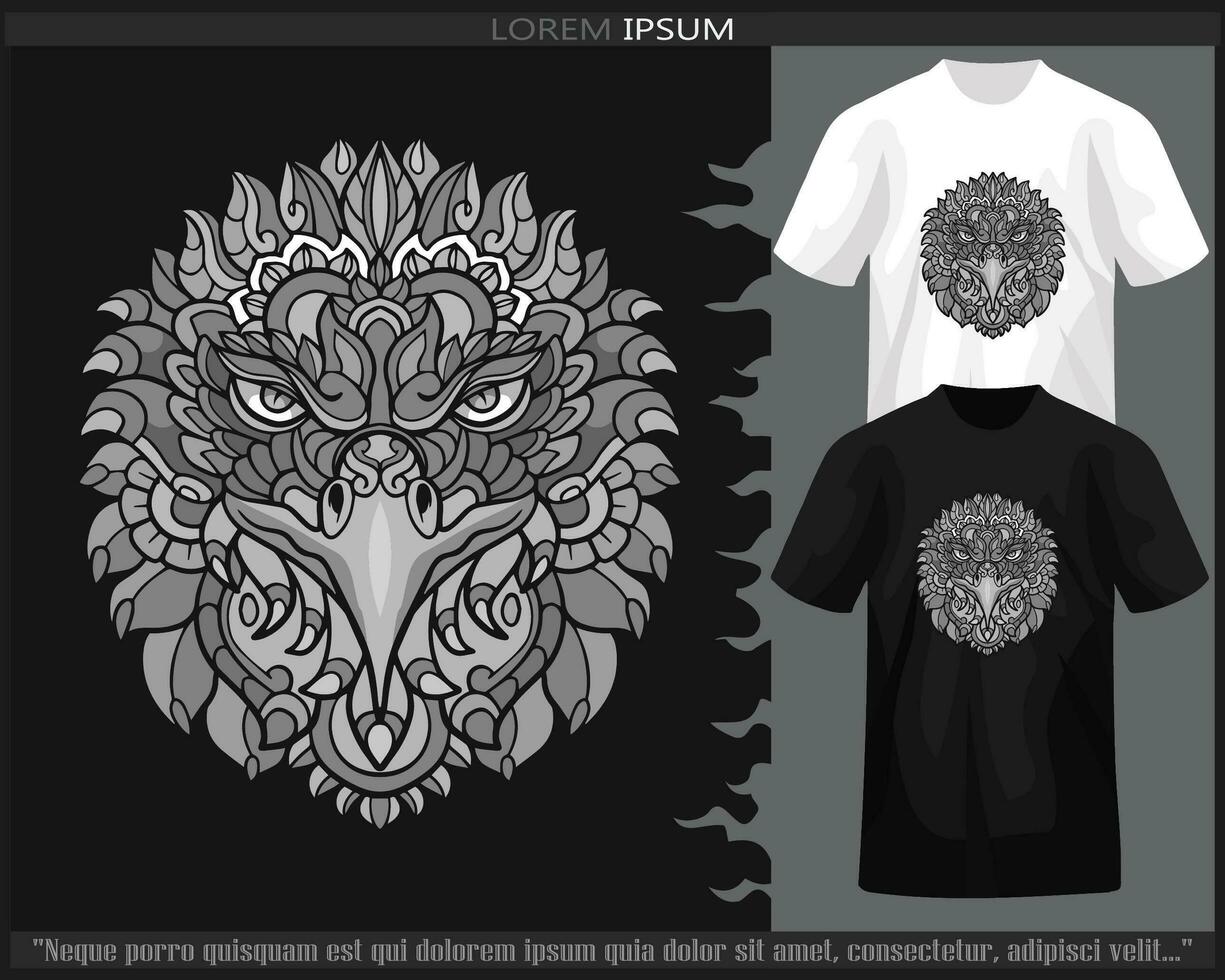 Monochrome eagle head mandala arts isolated on black and white t shirt. vector