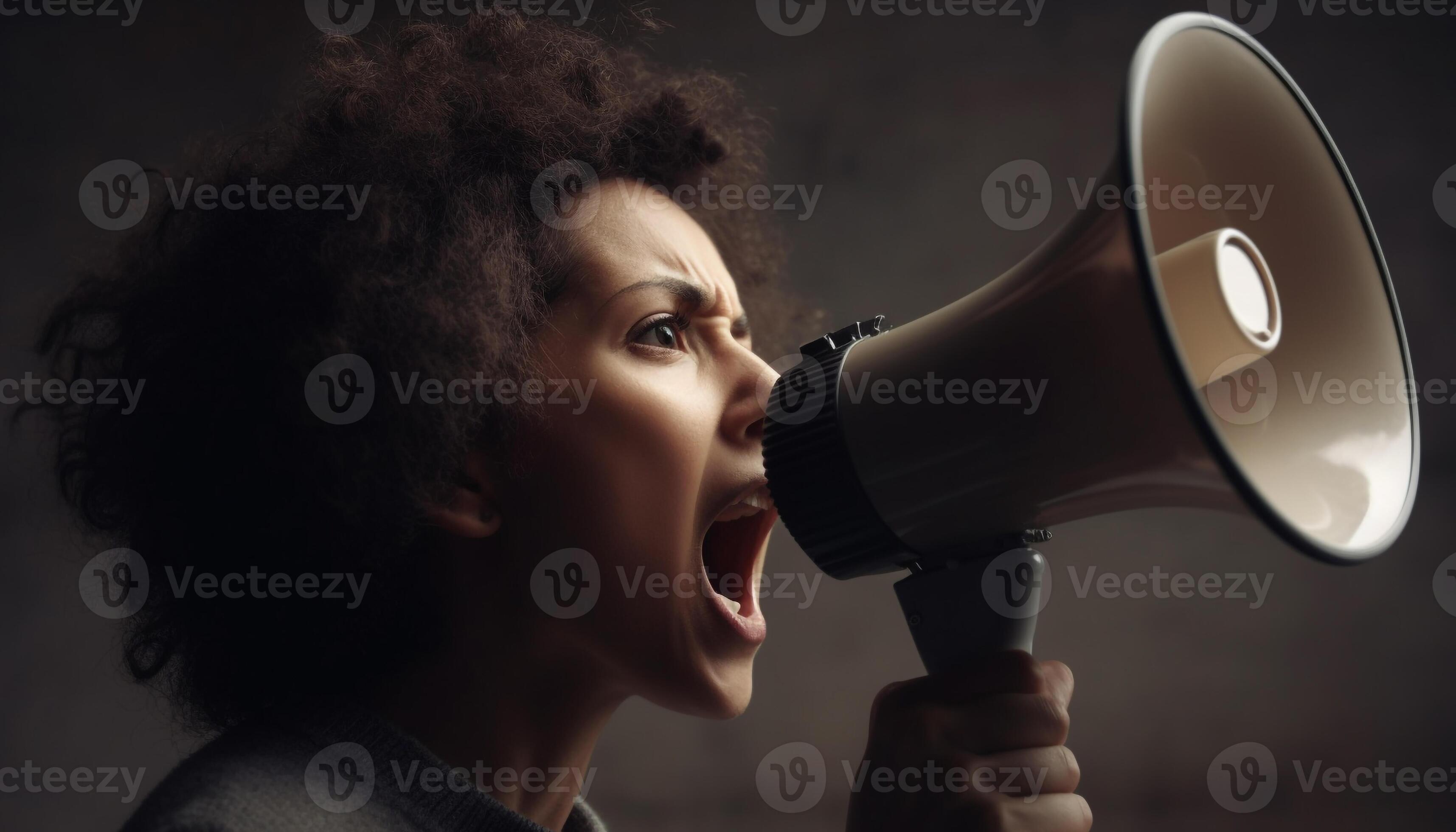 Young women shouting into megaphone, broadcasting message of protest generated by AI 24580172