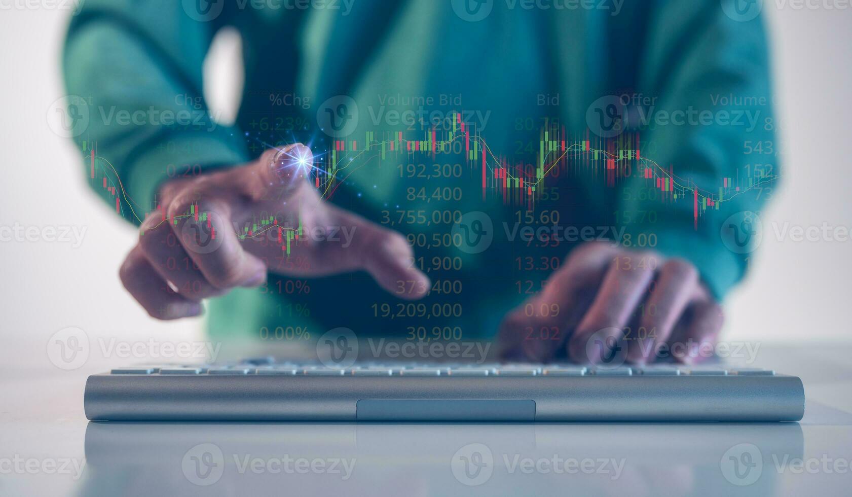 financial investment concept, businessman typing on computer keyboard  touching virtual trading graph buy and sell share in concept of investment business growth and marketing photo