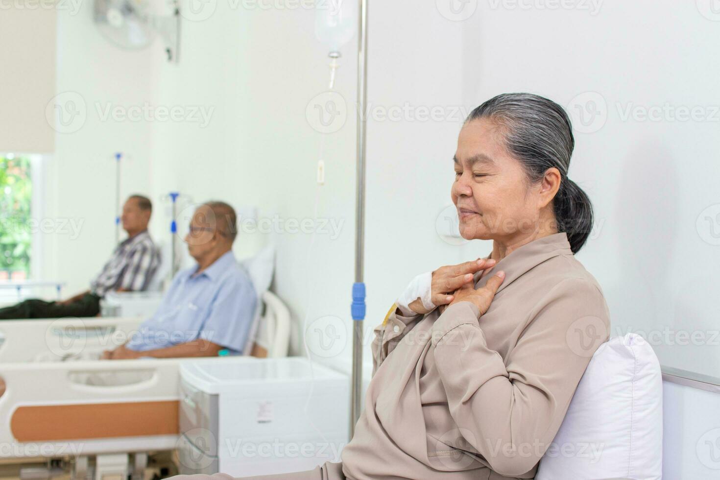 Nursing Home Care concept. A group of elderly people in nursing homes meeting with nursing care assistants photo
