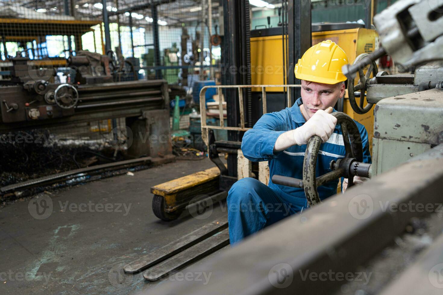 caucasian men engineer worker skills quality, maintenance, training industry factory. male waring protective workwear, helmet. photo