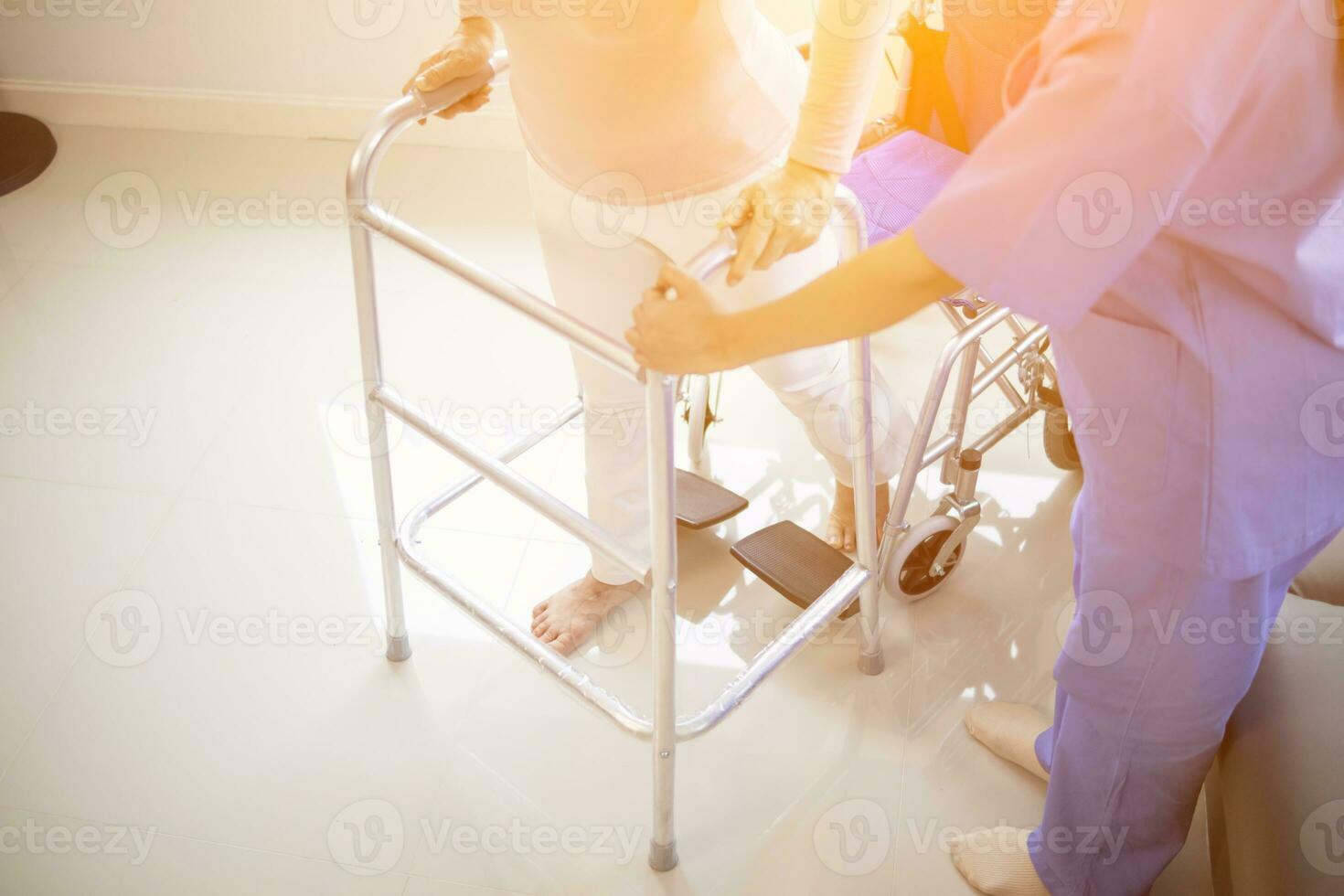 Physical therapists are helping elderly people to take care of themselves after a long period of recovery and they need regular physical therapy to help their bodies recover. physical therapy concept photo