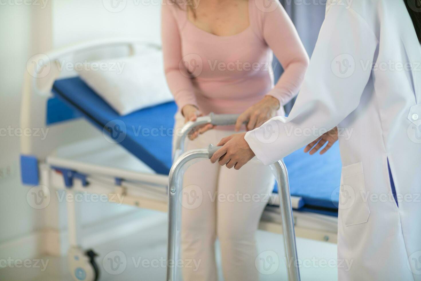 Physical therapists are helping elderly people to take care of themselves after a long period of recovery and they need regular physical therapy to help their bodies recover. physical therapy concept photo