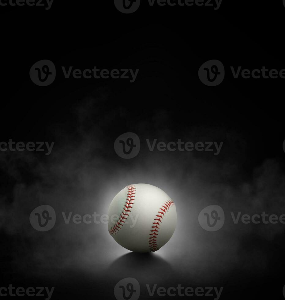 baseball ball with on black background with smoke photo