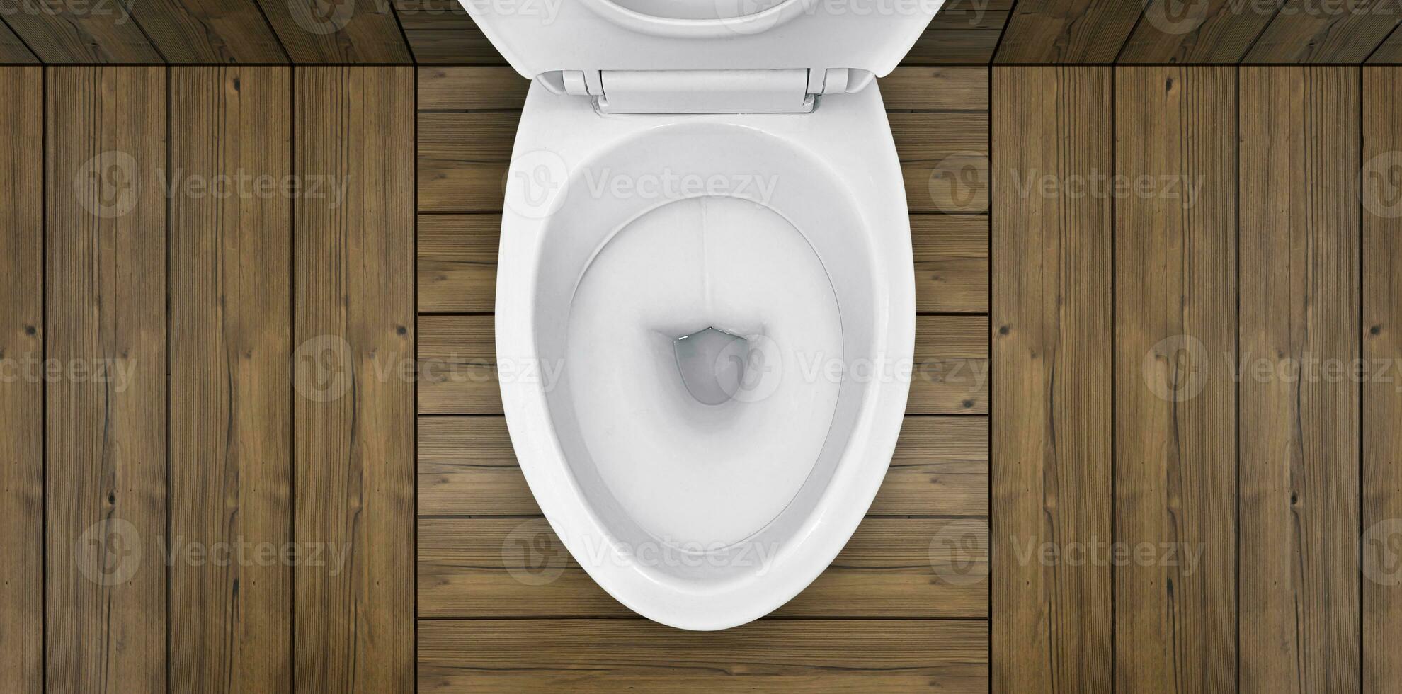 Top view. of toilet bowl in bathroom with wooden floor photo