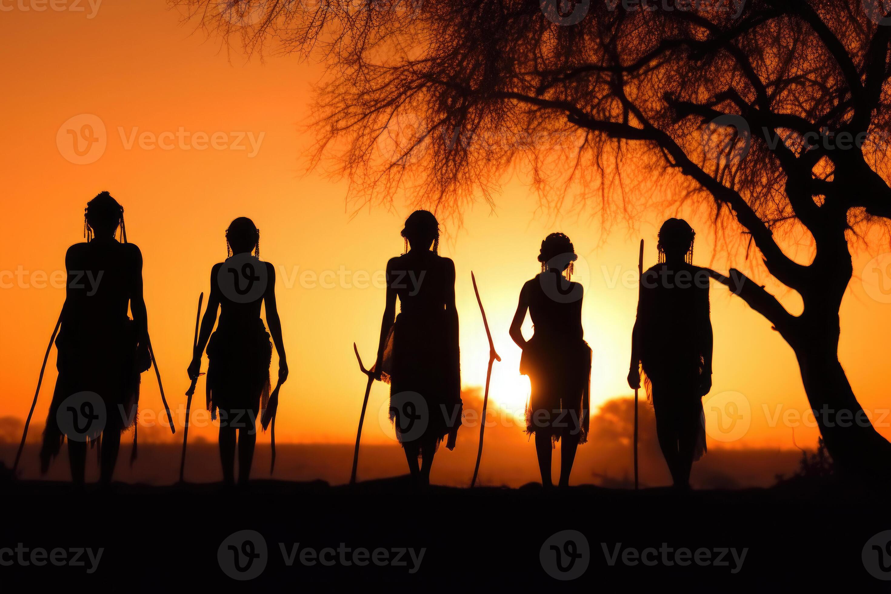 Silhouettes of african aborigines at sunset. 24597743 Stock Photo at ...