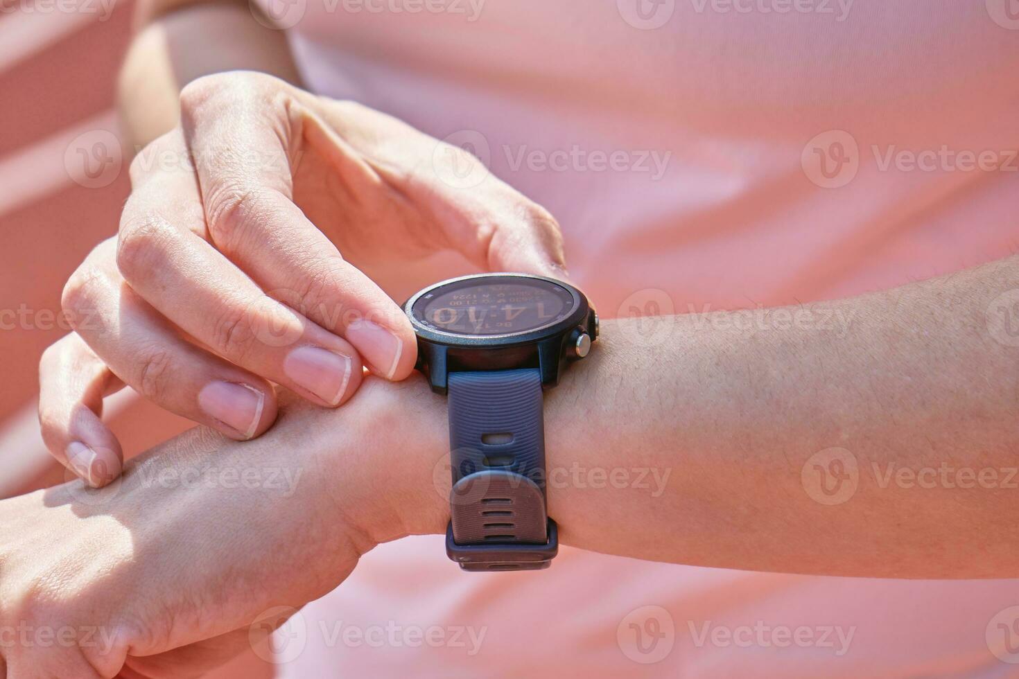 Woman use fitness smart watch, checking results after sport training photo