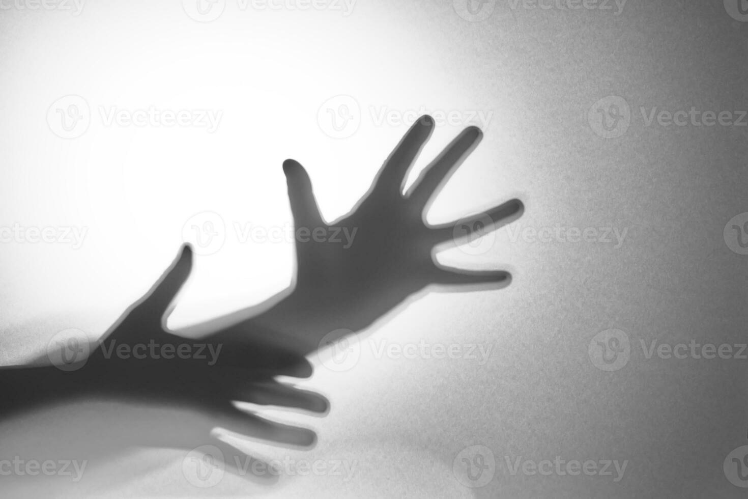 Hand shadows. Concept for illustrating the negative state. photo