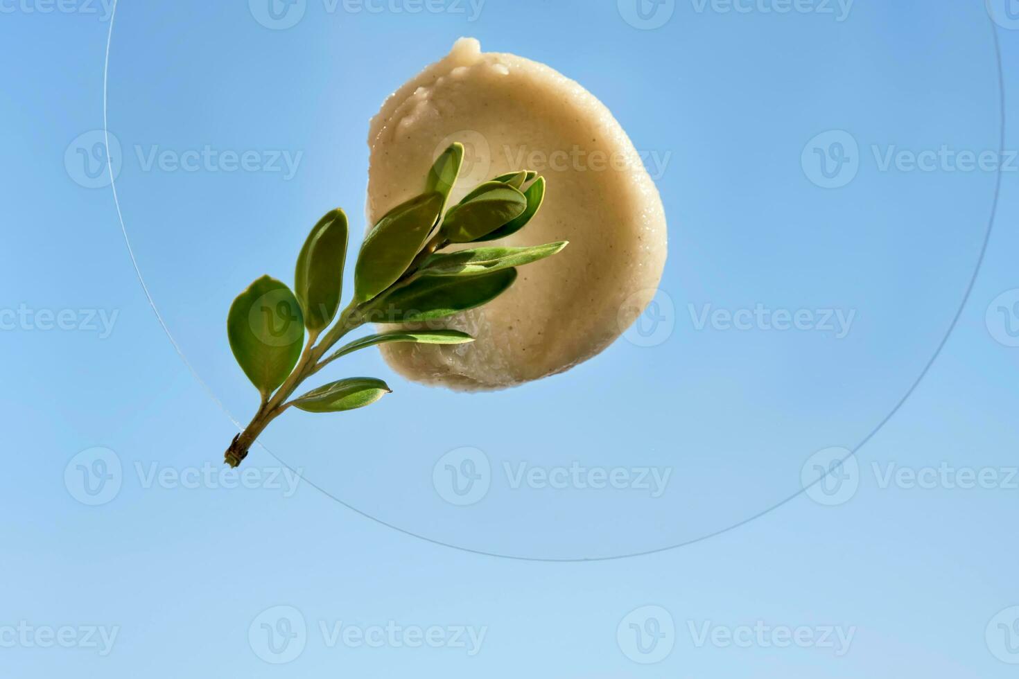 Swatch of an exfoliating peel against the sky. photo