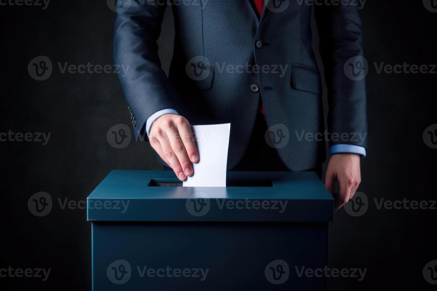 Voter hand put in bulletin in voting box. Elections concept. photo