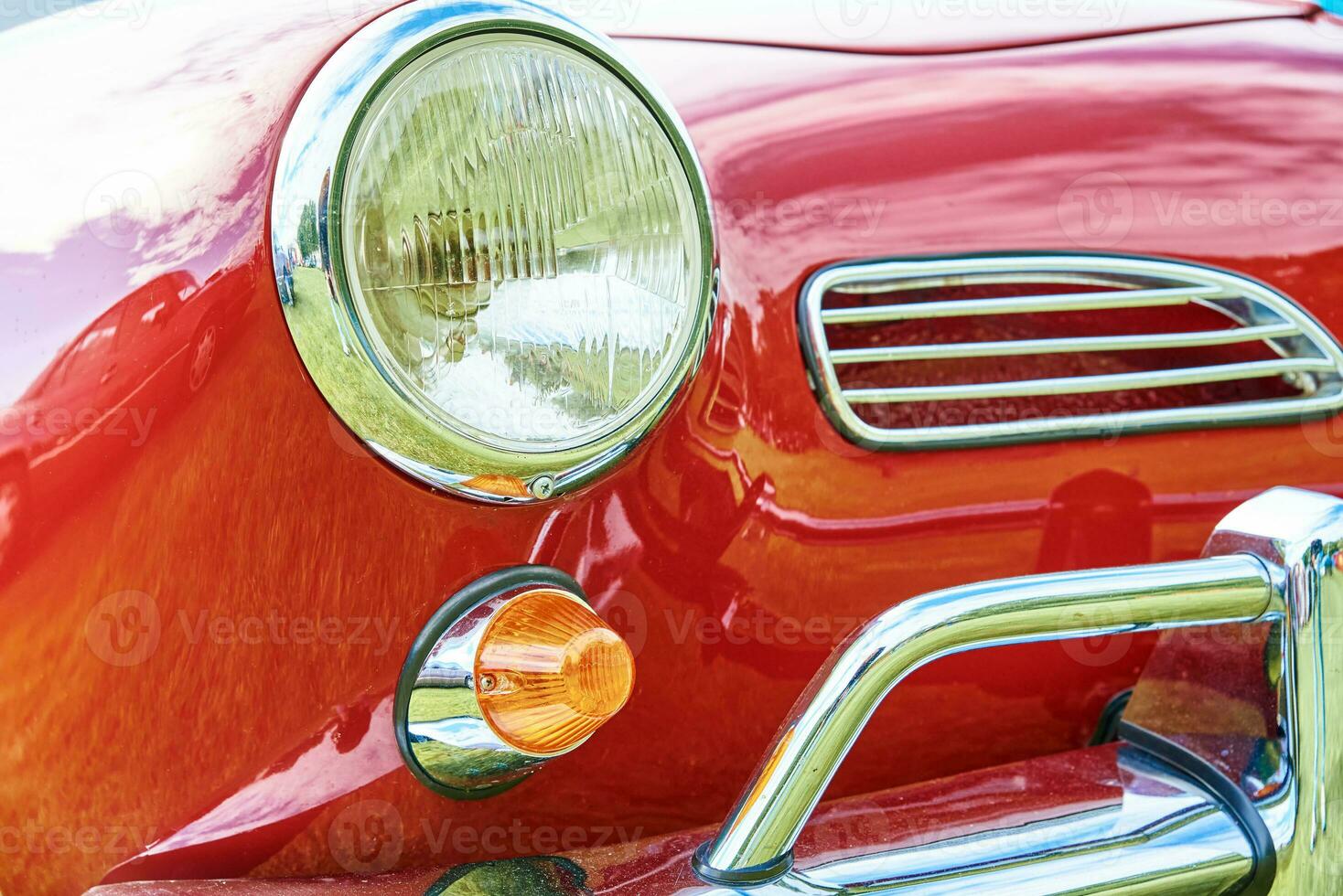 Closeup headlight of retro car photo