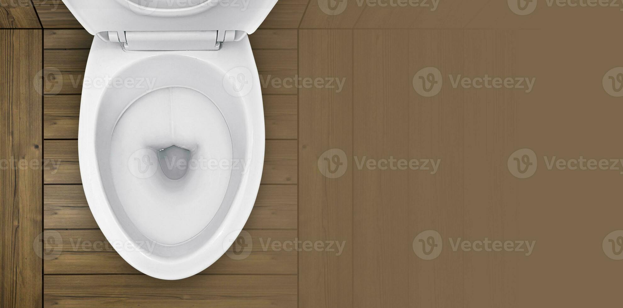 Top view. of toilet bowl in bathroom with wooden floor photo