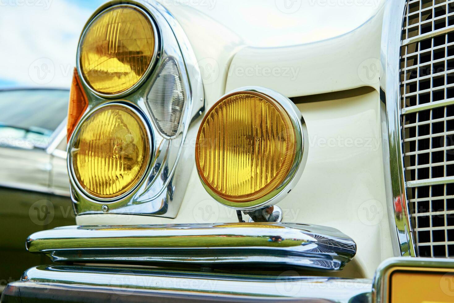Closeup headlight of retro car photo
