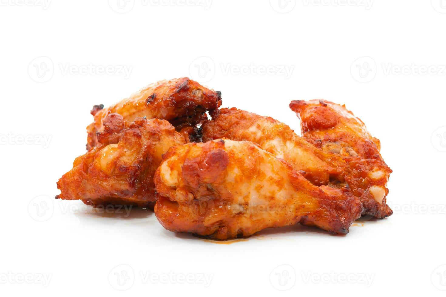 Grilled chicken legs and barbecue chicken on a white background photo