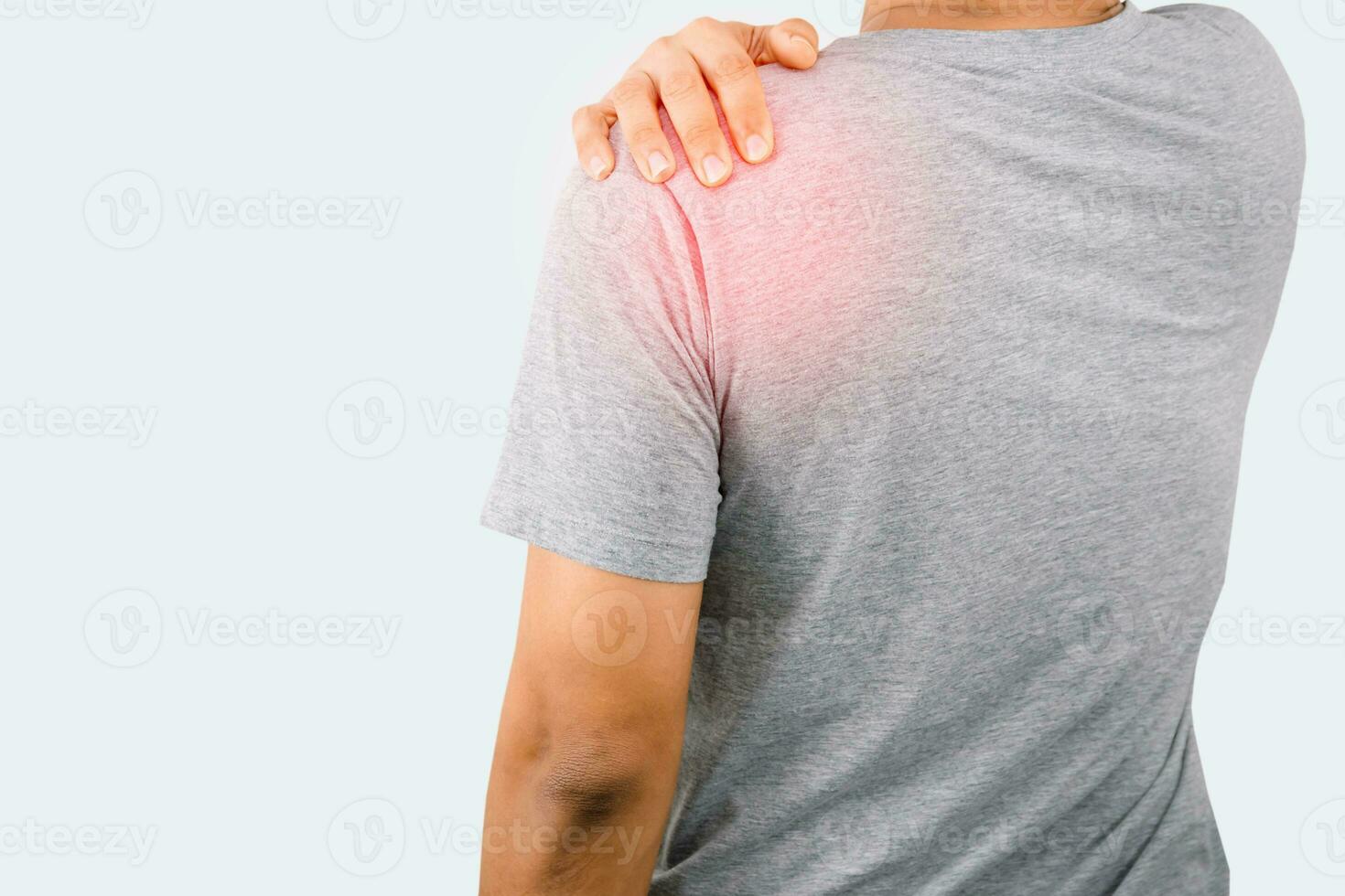 Man holding the shoulder Have back and shoulder pain photo
