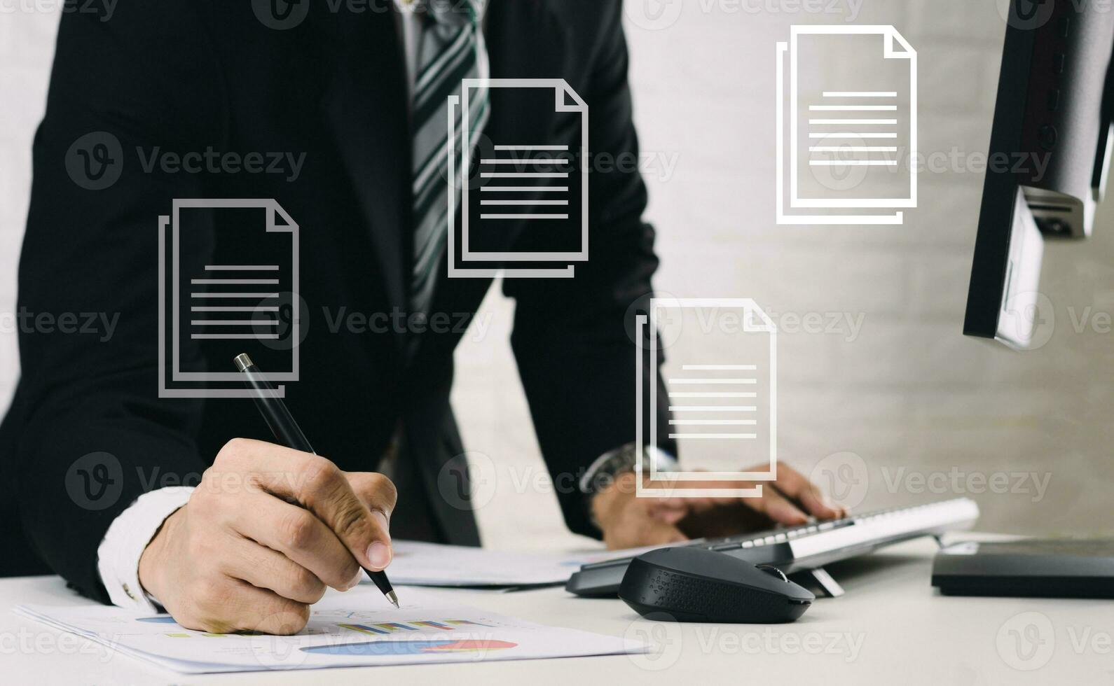 Document Management System concept Business men work on the table Analyze graphs financial report in documents and computers. photo