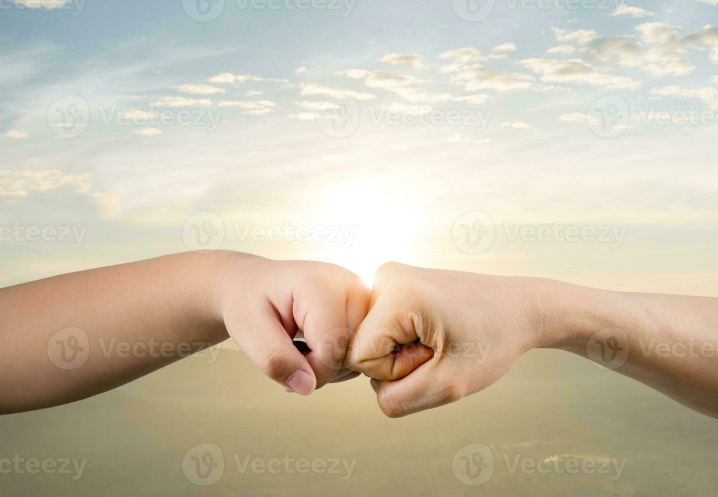 fist bump and knuckle hand children and adult photo