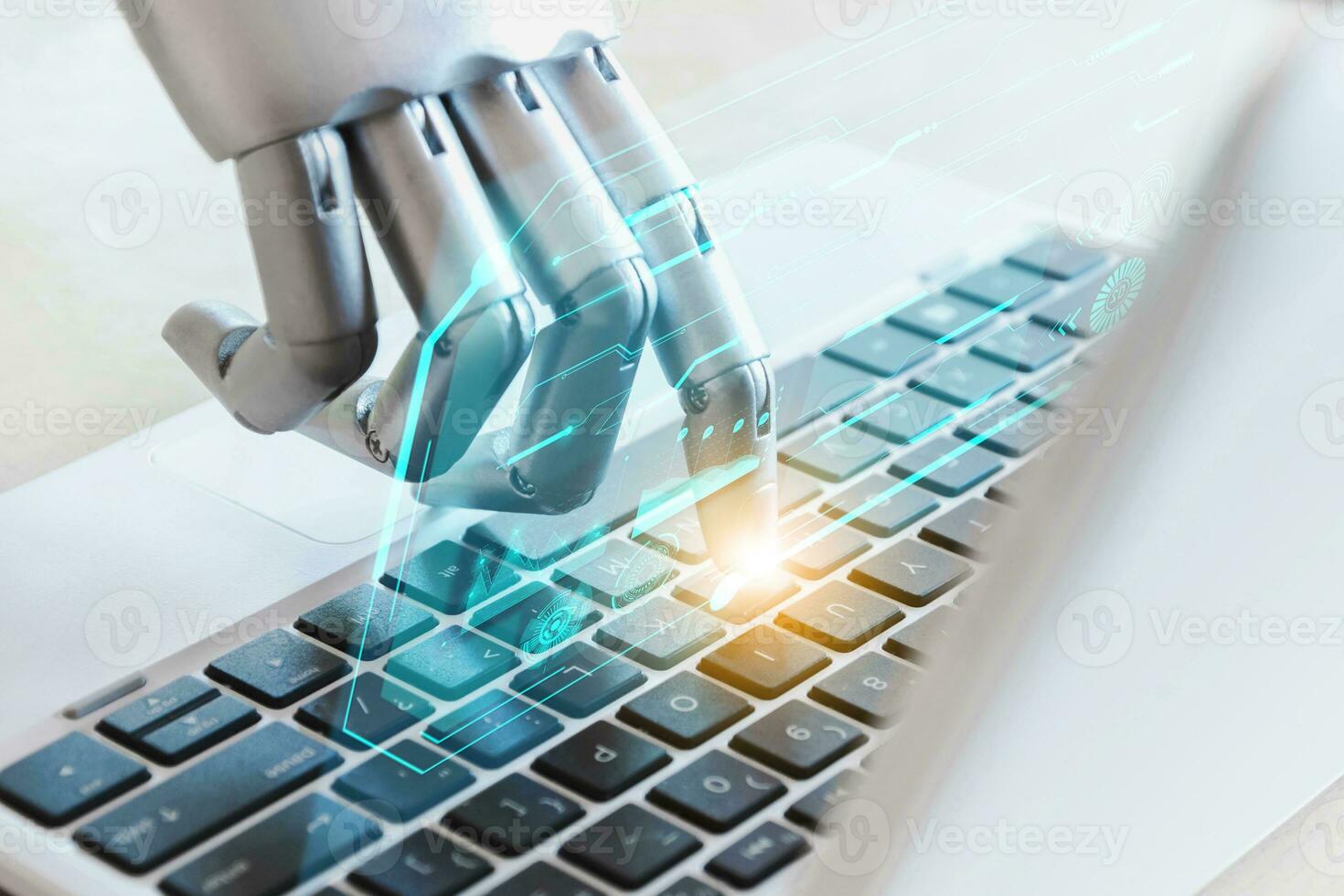 Robot hands and fingers point to laptop button advisor chatbot robotic artificial intelligence concept photo