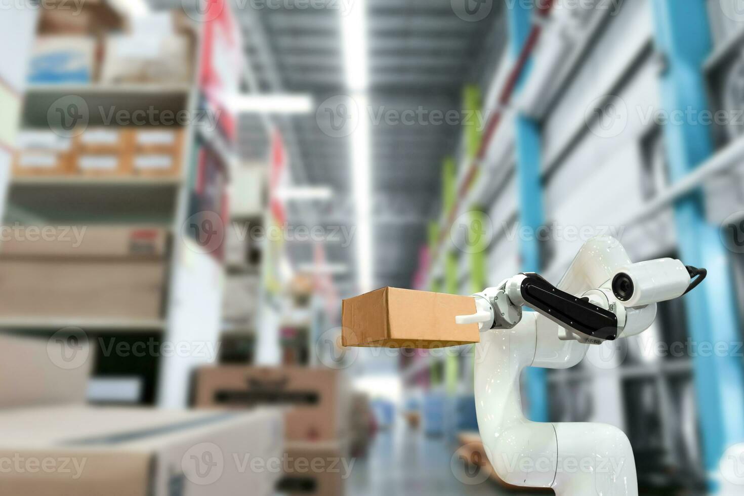 Industrial technology using robots mechanical arm the box in the factory photo