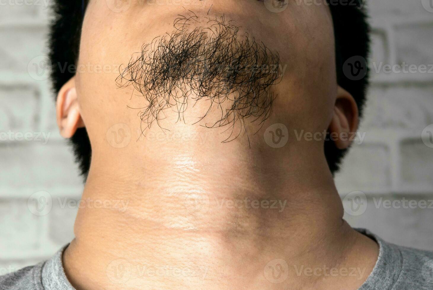 man asia with a long beard on the chin close up photo