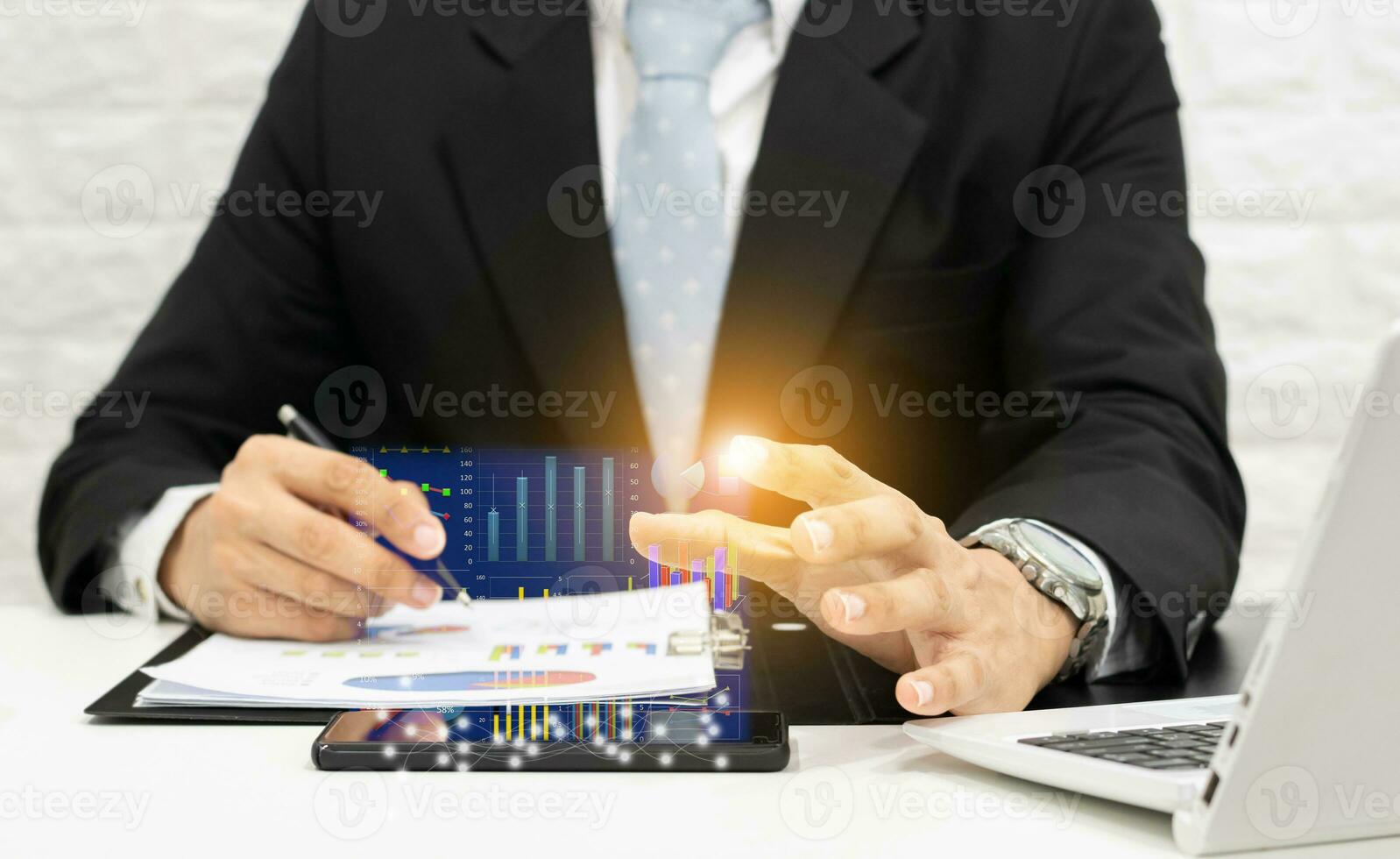 Businessman concepts hands pointing finger touch screen graph and chart photo