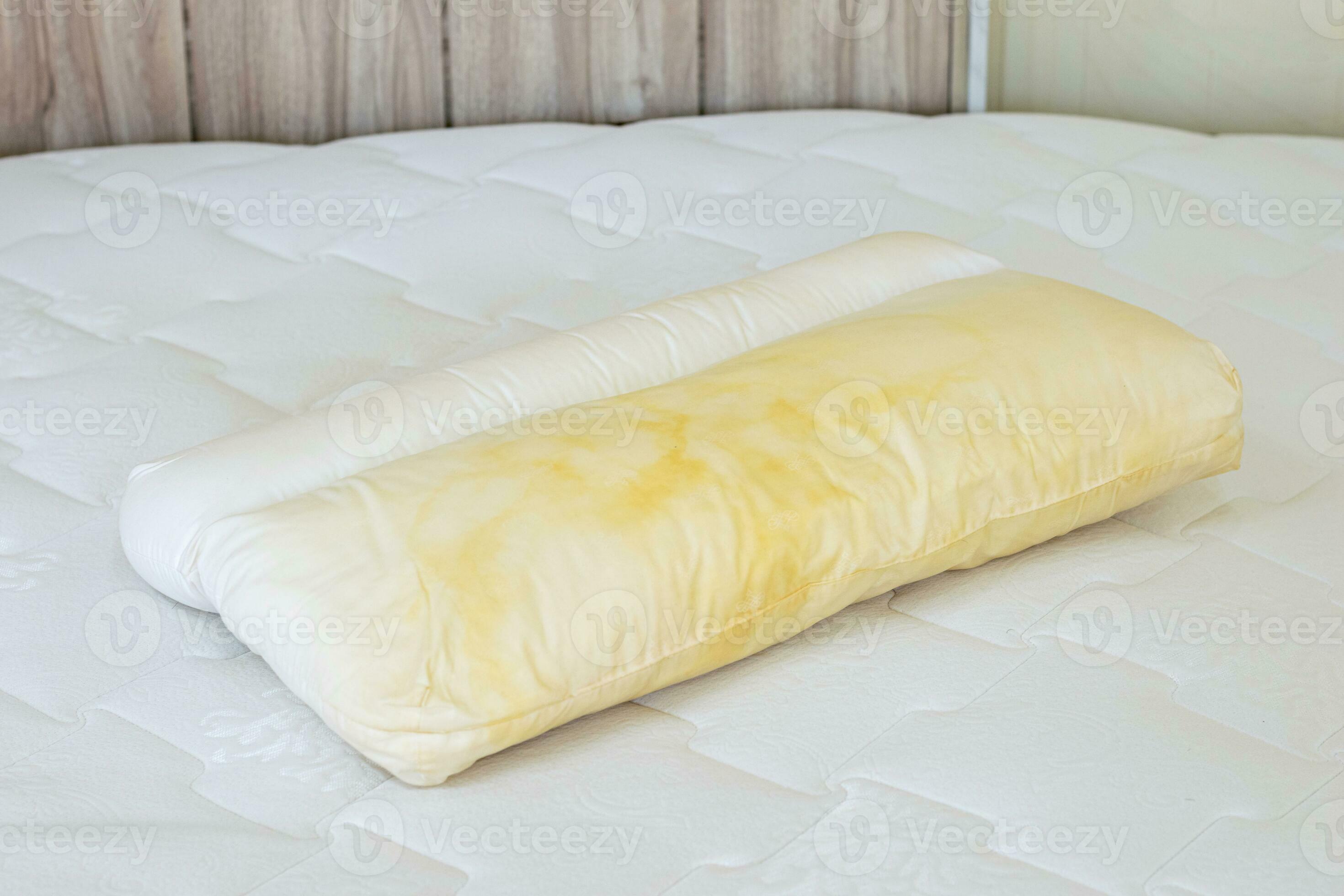 Pillow with yellow saliva stains 24604857 Stock Photo at Vecteezy