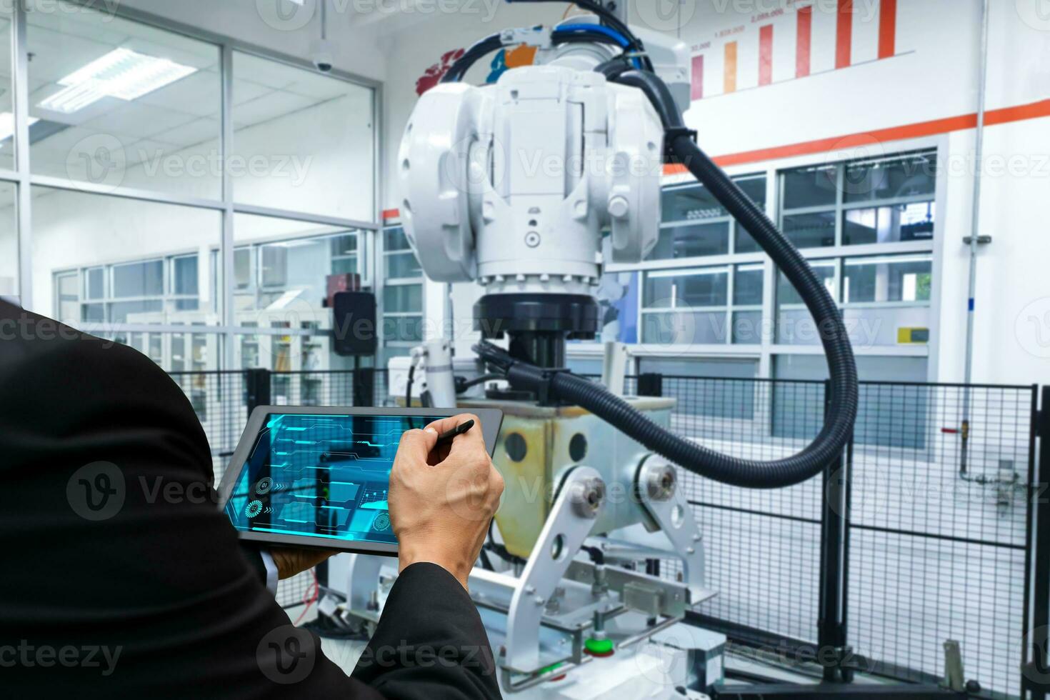 Industrial technology concept of manufacturing using robotic arms. photo
