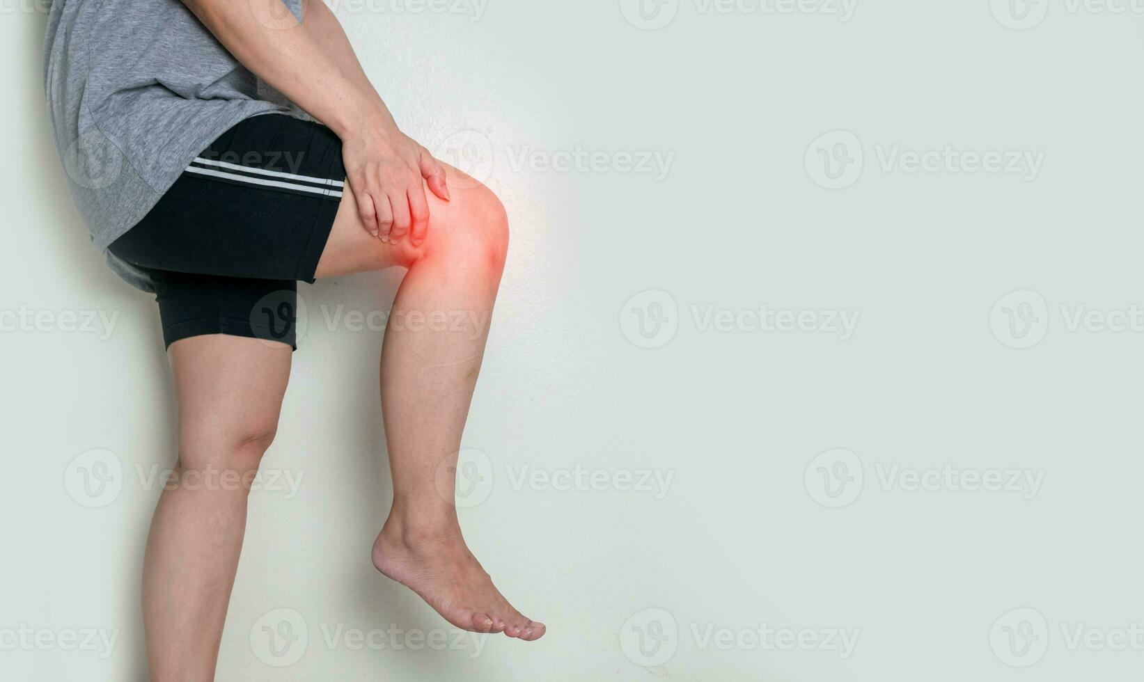 Human leg osteoarthritis inflammation of bone joints on white background photo