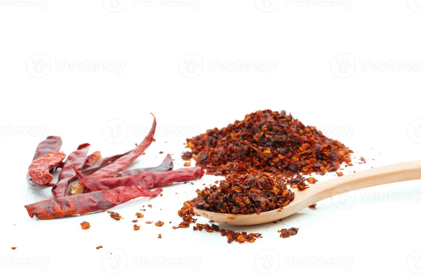 Dried chili meal on a white background photo