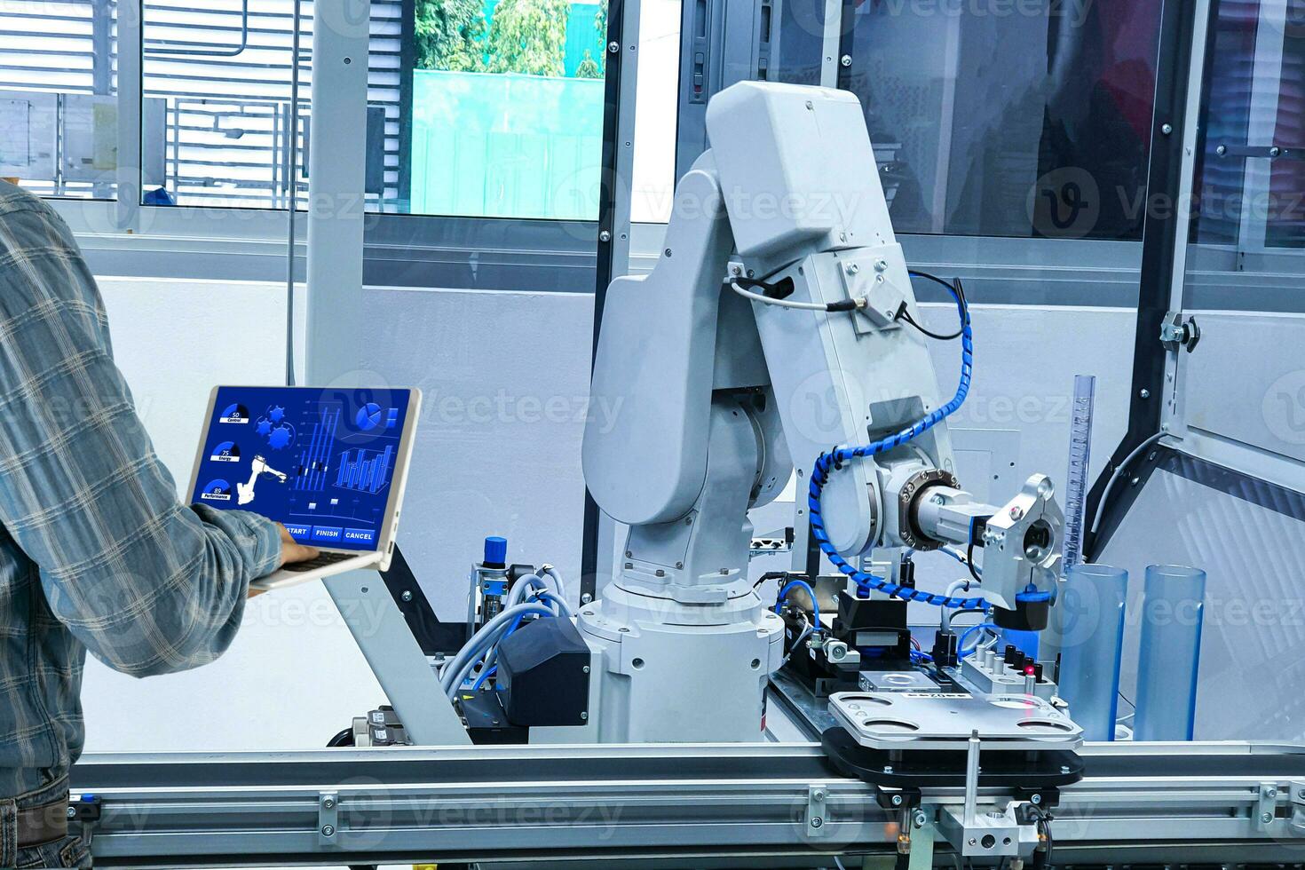Manager engineer check control automation Robotic arms, industrial robots, factory automation machines photo