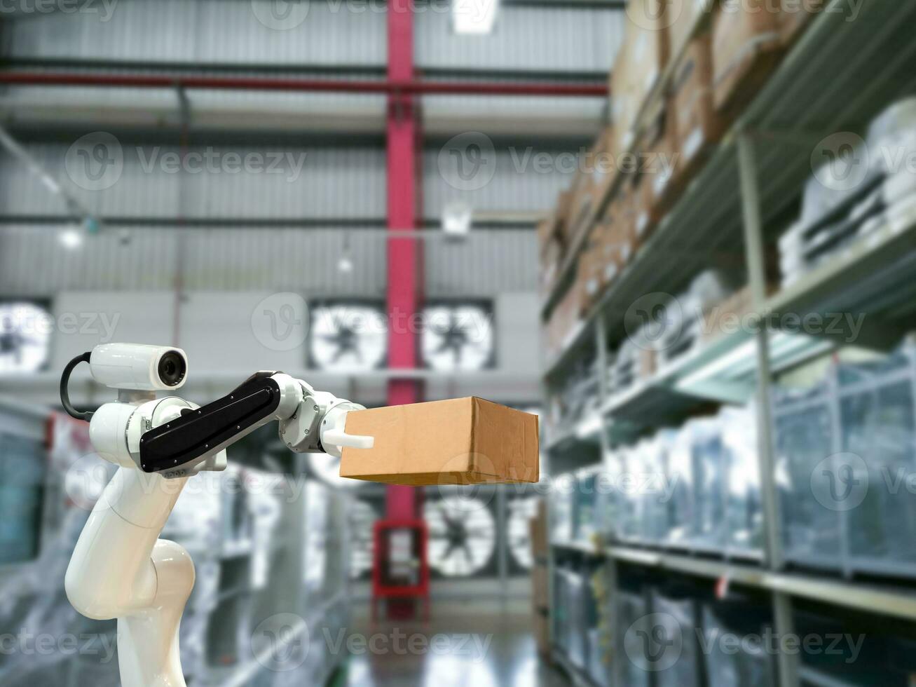 Industrial technology using robots mechanical arm the box in the factory photo