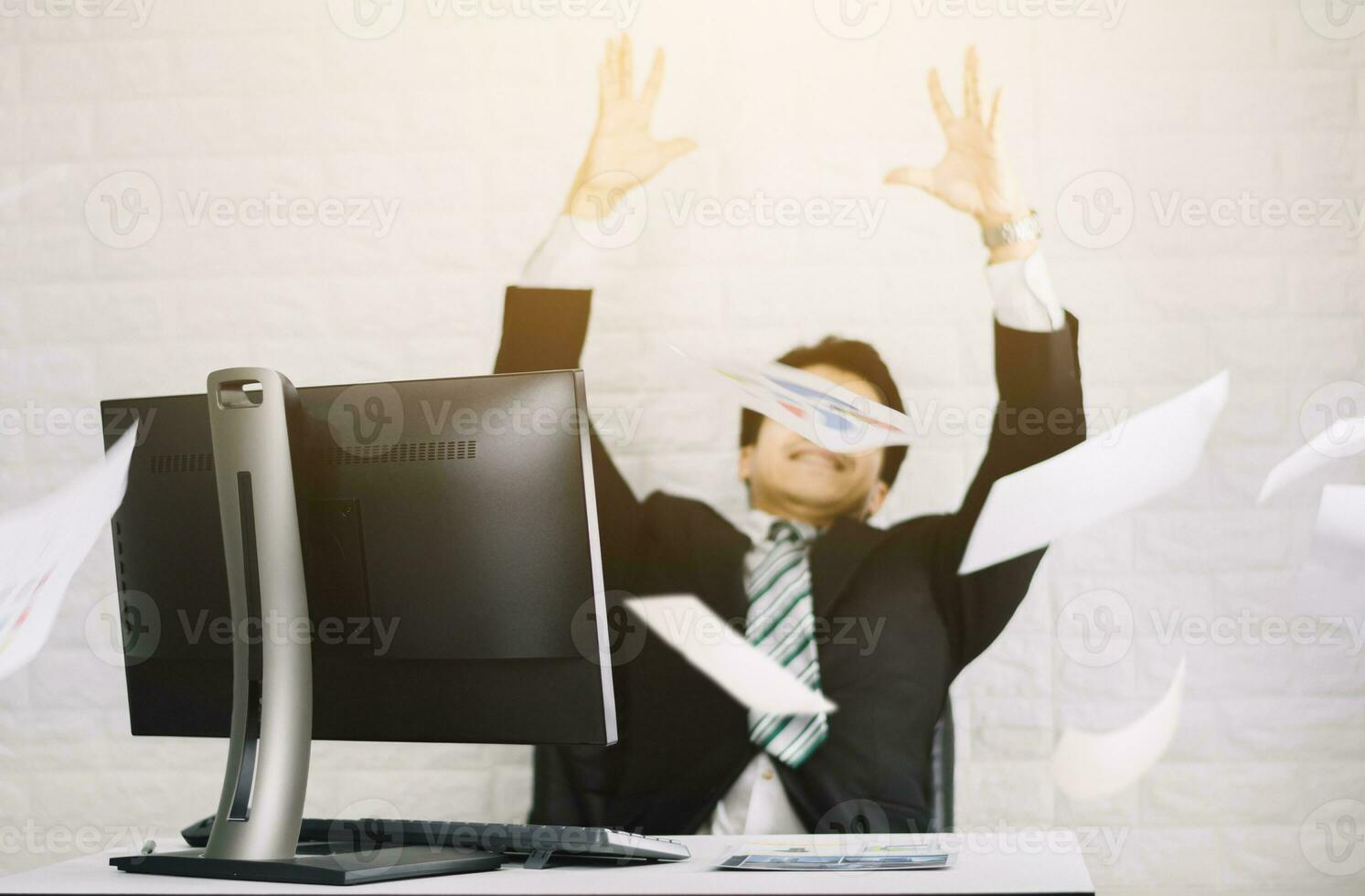 Happy business men throw documents Successful job photo
