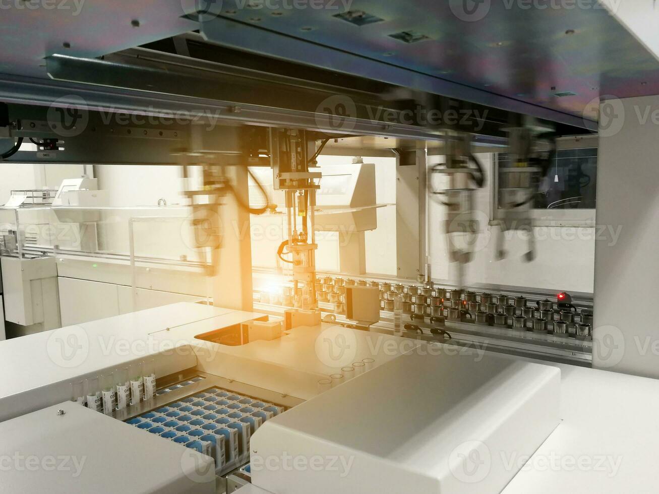 Automated robots in the medical lab photo