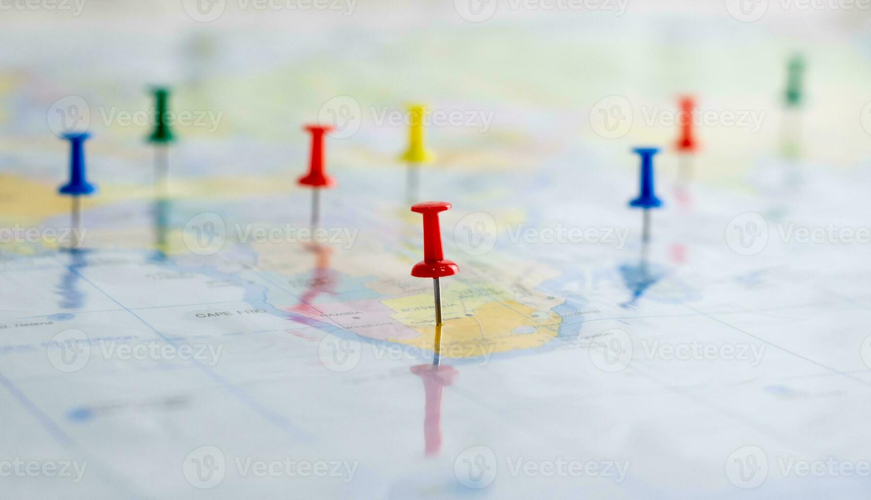 Push pin on the world map photo
