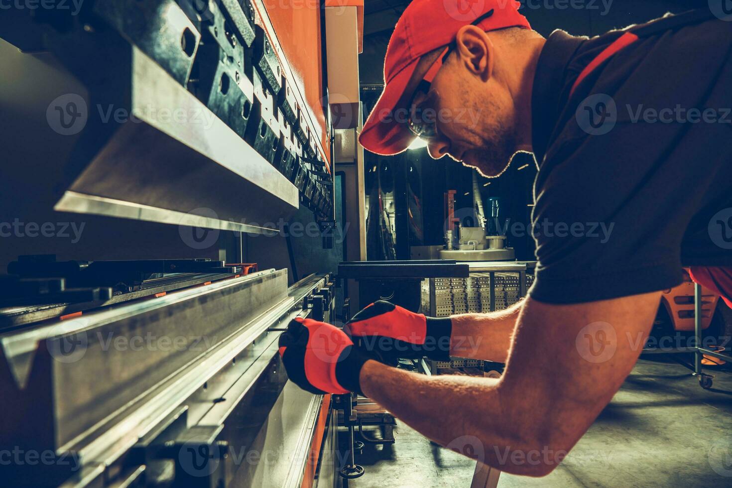 Industrial Bending Machine Operator at Work photo