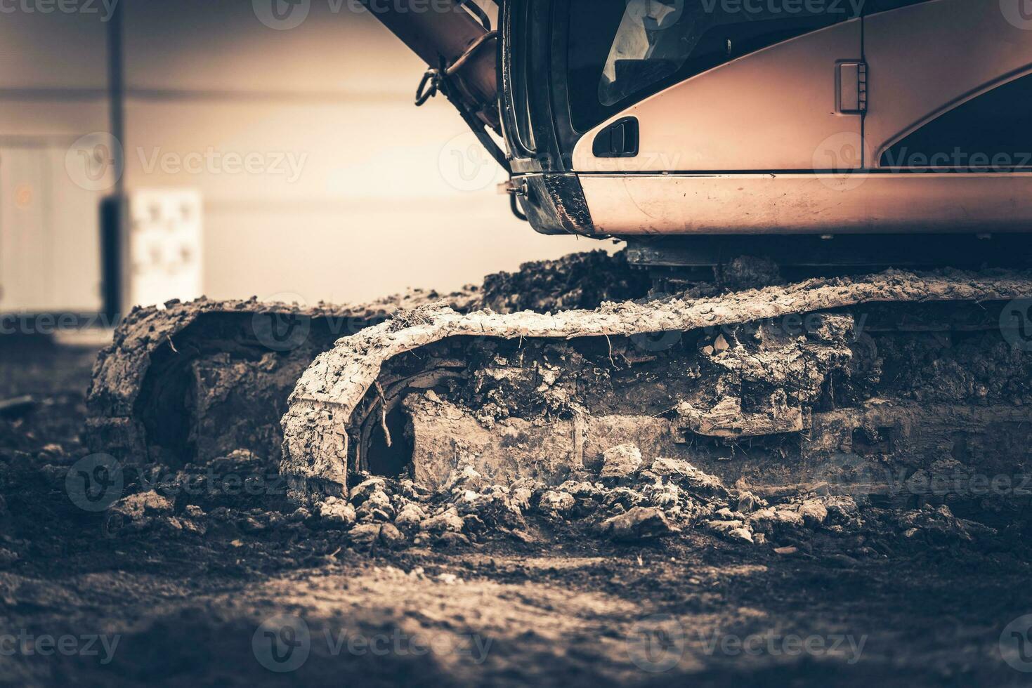 Caterpillar Track Full of Mud photo