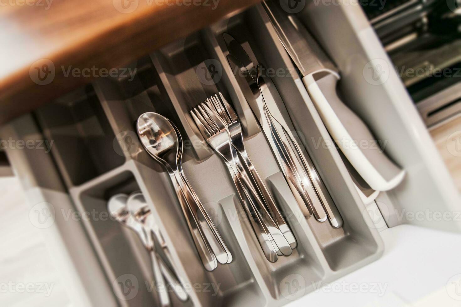 Silverware Set in a Drawer photo