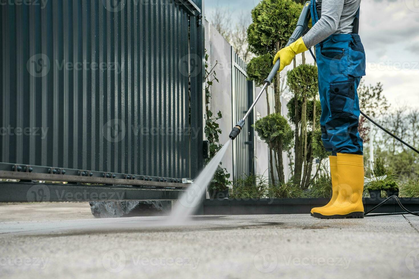 Man Washing the Driveway photo