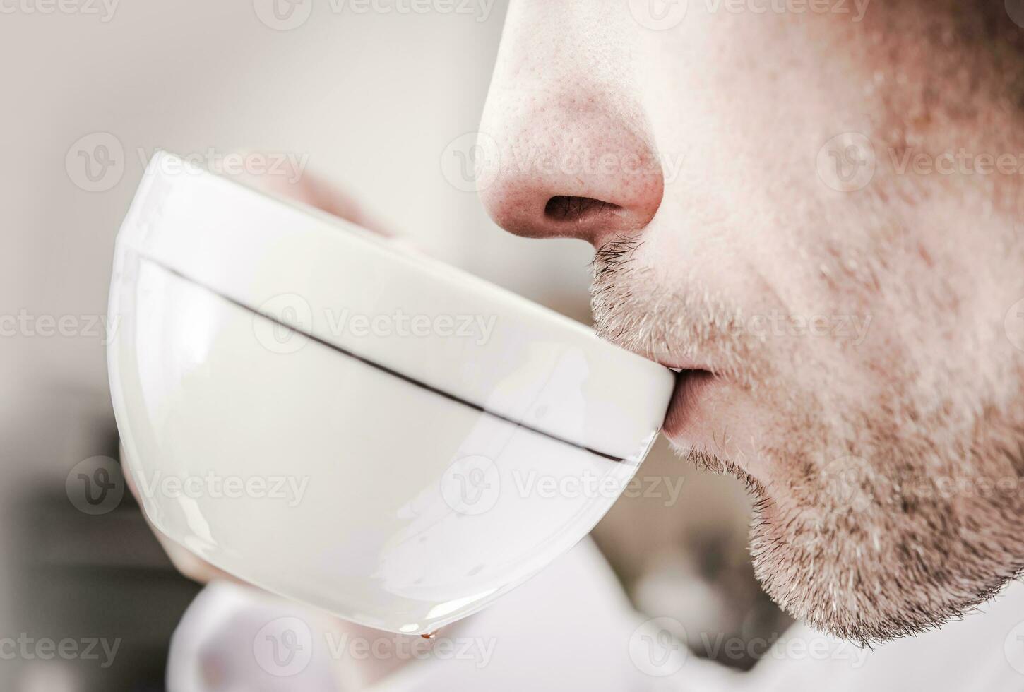 Men Drinking Espresso photo