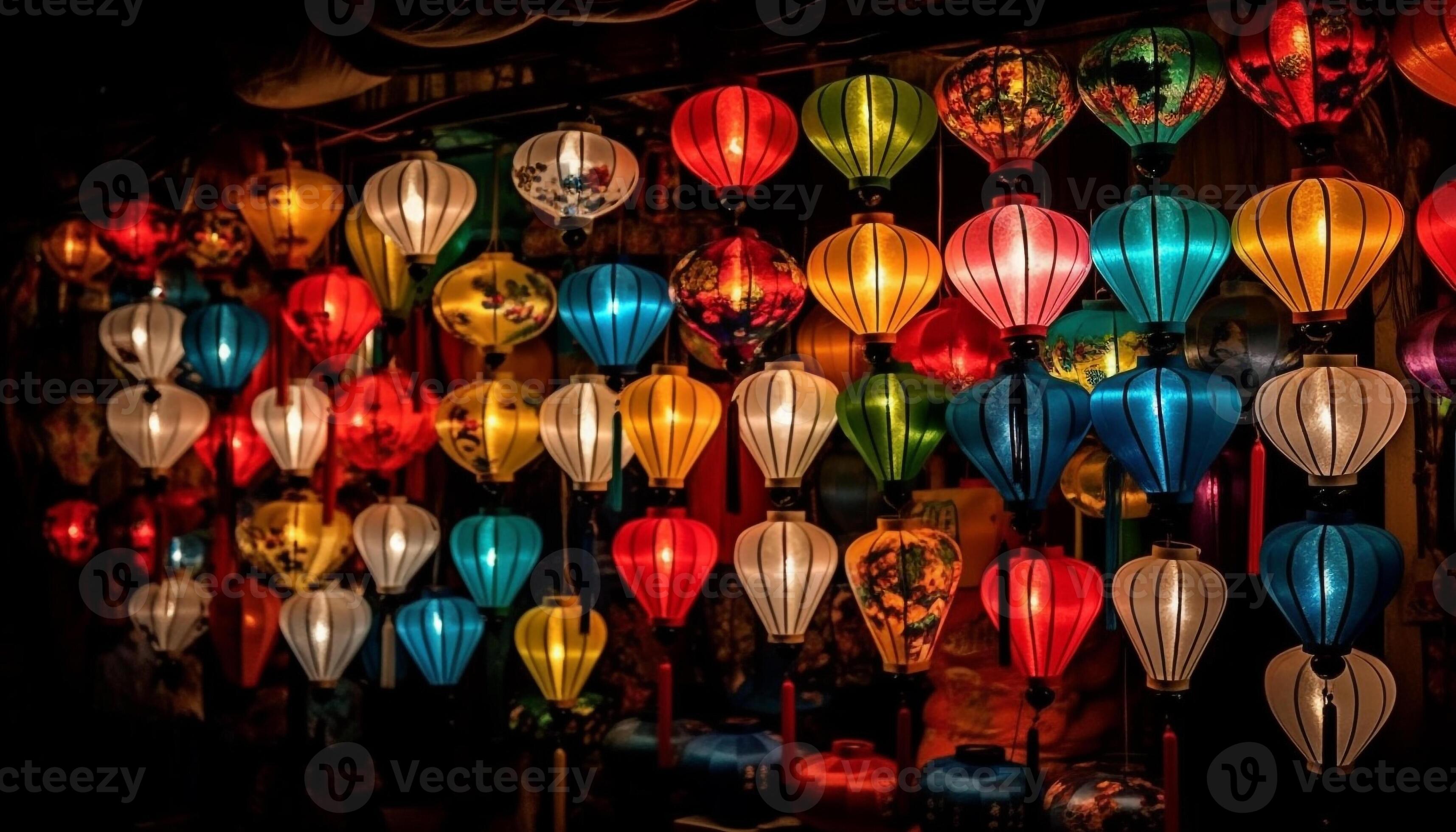 Multi colored paper lanterns hanging in rows illuminate the night sky