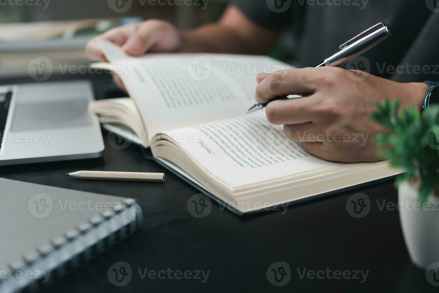 learning online class by using laptop computer and writing notebook at workplace, Education development or knowledge improvement concept. photo
