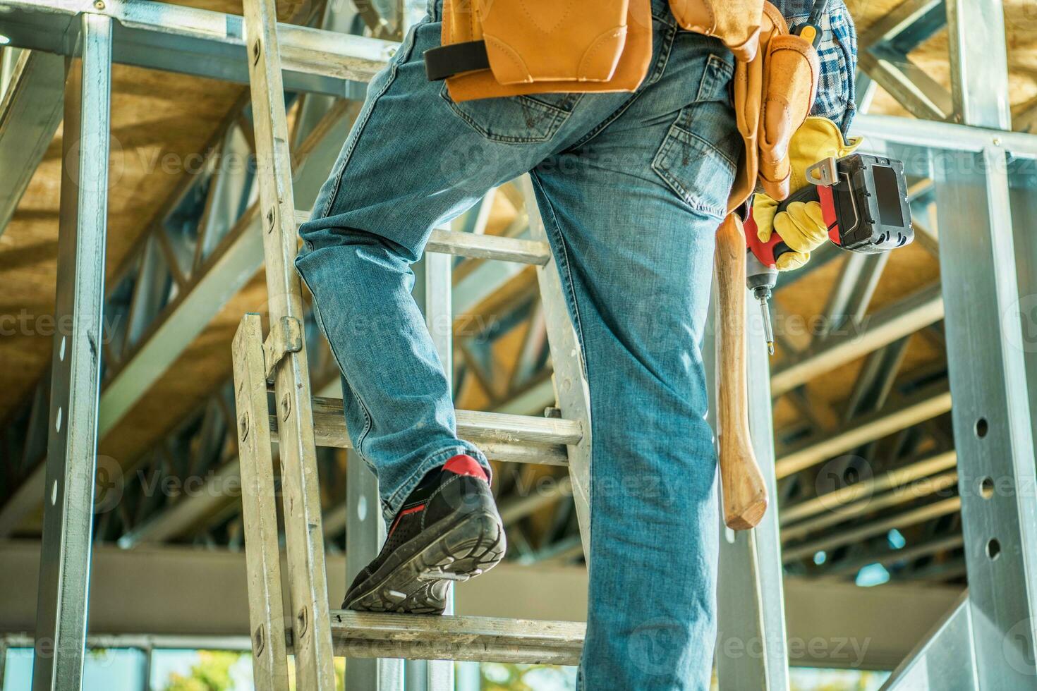 Contractor on a Ladder photo